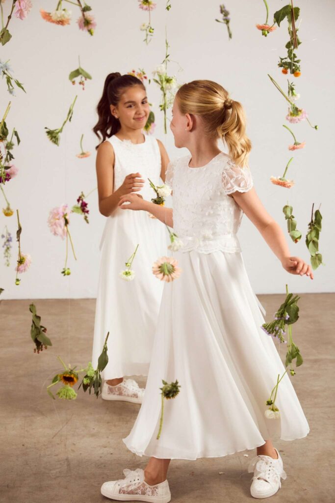 Kommunionkleider von Weise, schlicht und kindgerecht.